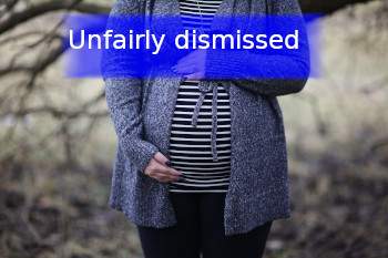  pregnant woman with banner that reads unfairly dismissed 