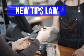 Person making an electronic payment and banner stating new tips law